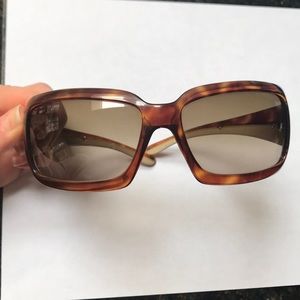 Prada sunglasses, tortoise shell frame.